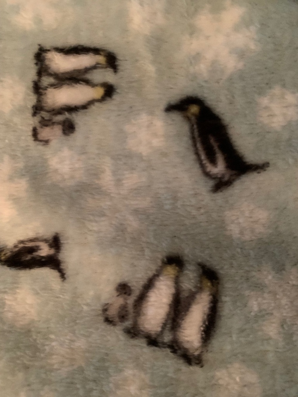 Cozy soft blanket with penguins and snowflakes